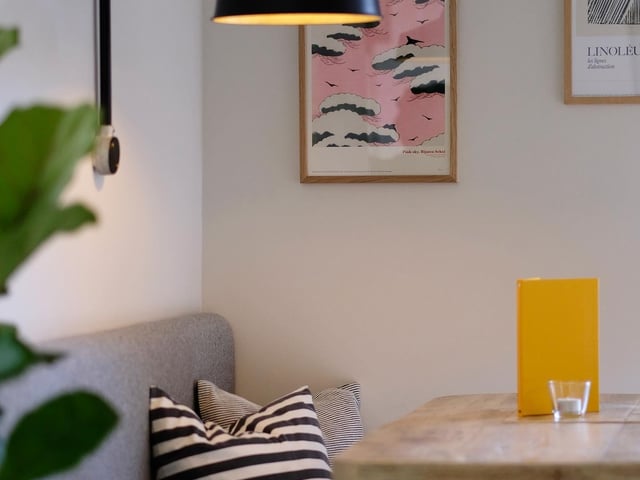 There's plenty of nice spots for eating and drinking at Herringbone, and we just love those stiped cushions.