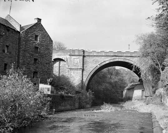 Belford Bridge was completed in 1887 and carries Belford Road over the Water of Leith. Year: 1944