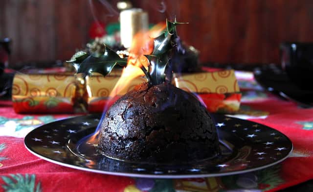Some Christmas puddings get more attention than some pets, before they are ceremoniously set on fire (Picture: Peter Byrne/PA Wire)