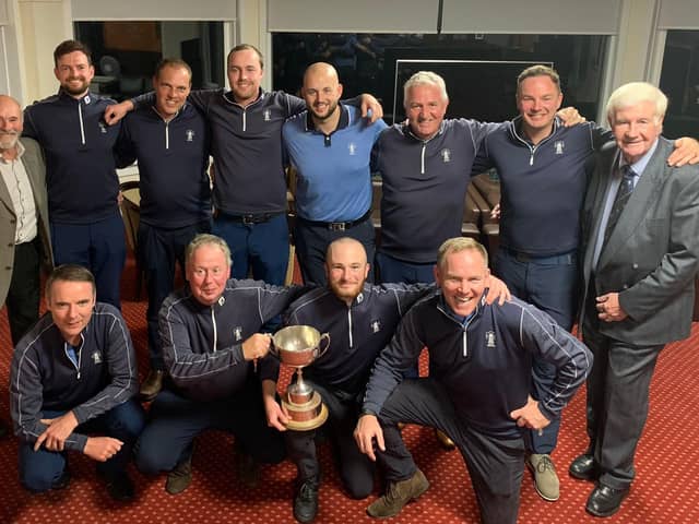 Duddingston celebrate winning the Inter Cities Cup for a second time after beating Glasgow GC at Hilton Park.