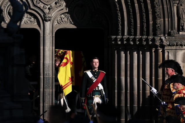 Pallbearers carry the coffin of Queen Elizabeth II from St Giles' Cathedral, Edinburgh after a prayer service.