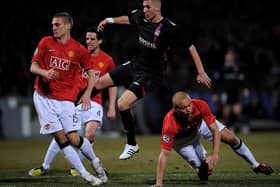 Karim Benzema scores for Lyon against Manchester United in the last 16 of the Champions League in 2008. This was the last competitive tie between the clubs, which United won 2-1 on aggregate. Picture: Getty