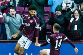 Ellis Simms celebrates his first Hearts goal with Cammy Devlin.