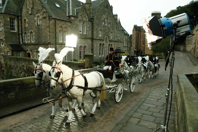 Dean Village was used as the backdrop for a Chinese bottled water advert which saw horse drawn carriages make their way through the streets. Year: 2006
