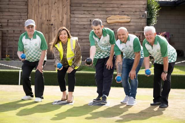 Members of Buccleugh Bowling Club, Dalkeith with Carmela McFarlane, field sales manager, Dandara. From left: Owen Patterson, Carmela McFarlane, Paul Kemp, Jon Martin and Ian Lockart, with some of the equipment funded by Dandara. Photo by Tina Norris.