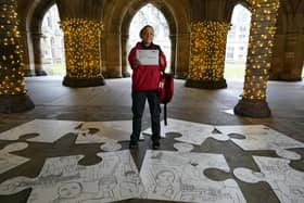 Postal worker Patrona Tunilla holds a sample letter during the launch of Scotland's Census 2022 (Picture: Andrew Milligan/PA)