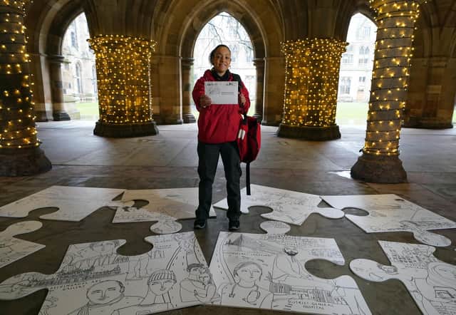 Postal worker Patrona Tunilla holds a sample letter during the launch of Scotland's Census 2022 (Picture: Andrew Milligan/PA)