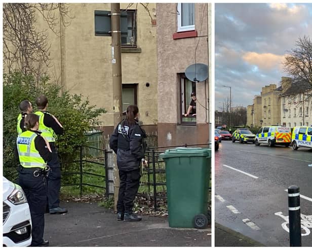 Two people have been rushed to hospital after a dog attacked three people in Edinburgh.