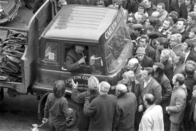 Miners and pickets block the path of a Carlton Coal lorry outside Haymarket coal depot during the miners' strike in January 1972.  Picture: Alan Ledgerwood.