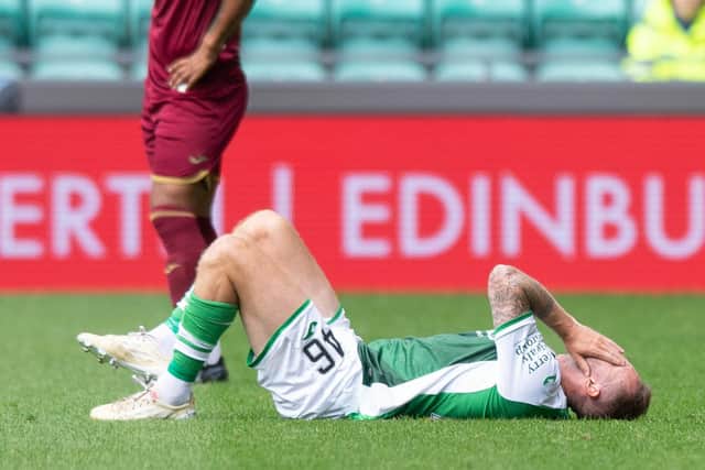 Hibs winger Aiden McGeady was forced off in the first half of the pre-season friendly win against Norwich with a knee injury