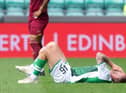 Hibs winger Aiden McGeady was forced off in the first half of the pre-season friendly win against Norwich with a knee injury