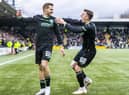 Chris Cadden celebrates with Josh Campbell after the own goal which put Hibs 3-1. The pair also combined well in the first half. Picture: Roddy Scott / SNS
