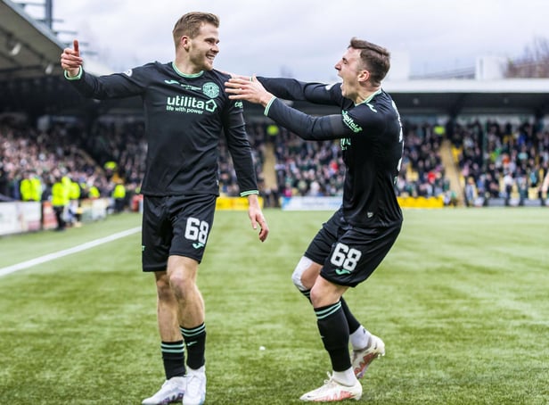 Chris Cadden celebrates with Josh Campbell after the own goal which put Hibs 3-1. The pair also combined well in the first half. Picture: Roddy Scott / SNS