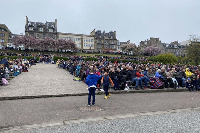 People enjoying happy atmosphere at packed Ross bandstand