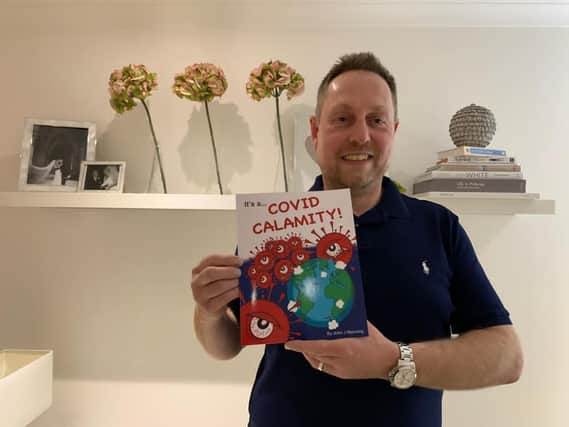 John J Manning and his new children's book "It's a...Covid Calamity!" (Photo: John J Manning).