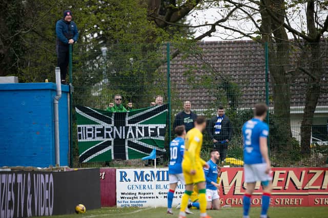 Some Hibs fans show their support for their side at Stair Park