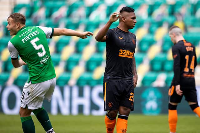 Ryan Porteous and Alfredo Morelos clash during the Hibs-Rangers match at Easter Road.