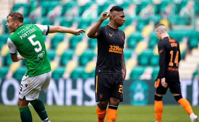 Ryan Porteous and Alfredo Morelos clash during the Hibs-Rangers match at Easter Road.