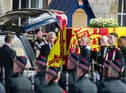 HM The Queen's coffin leaves the Palace of Holyroodhouse for the last time. Pic: Lisa Ferguson