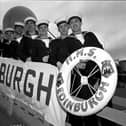 Local sailors line up on the gang plank of HMS Edinburgh at Leith Docks in December 1985.