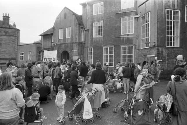 Mothers and children demonstrate outside the Elsie Inglis Memorial hospital in Edinburgh on the last day before it closes in October 1988. Picture: Denis Straughan