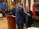 Ms Grahame being awarded the medal by the Consul General of the Republic of Poland in Edinburgh, Mr Łukasz Lutostański, at an event earlier this month at Edinburgh City Chambers to mark Polish National Day.