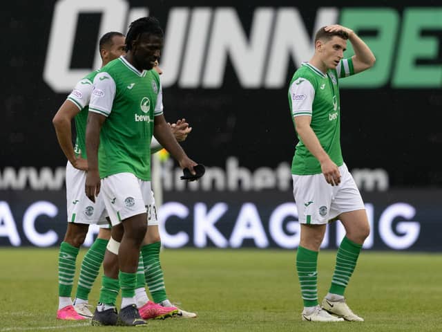 Defensive woes - Bushiri (left) and Hanlon look dejected after another loss.