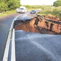 A section of a major road linking Edinburgh with the Northeast of England has collapsed during dramatic thunderstorms last night.