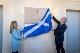 Angus Robertson and French Veterans Minister Patricia Miralles unveil a plaque in memory of Scottish soldiers who fought for France from 1295 onwards