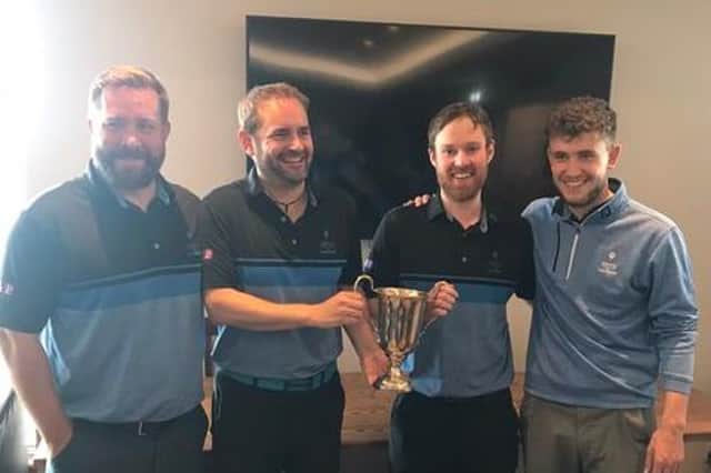 Baberton's triumphant team get their hands on the trophy after winning the Edinburgh Inter-Club Tournament at Swanston.