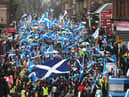 Tens of thousands of Scottish independence supporters march under the All Under One Banner movement