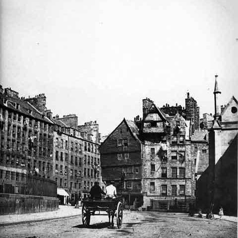 A horse and cart trundles towards Bowhead House and the Lawnmarket in the Old Town.