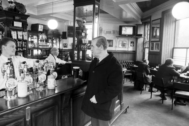 Customers drinking in The Diggers (now the Athletic Arms) pub at Angle Park Crescent Edinburgh, winner of the Evening News Pub of the Year award in January 1993. This old pub is a favourite for Hearts fans on match days for a quick pint before and after the games at nearby Tynecastle Park.