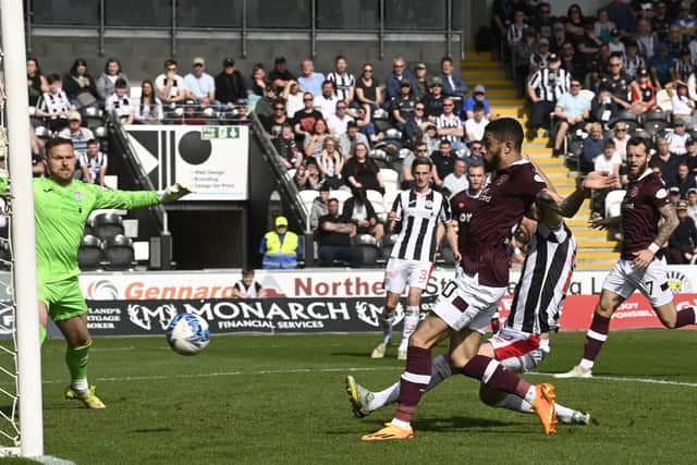 Josh Ginnelly brings Hearts back into the match with a goal at the back post. Picture: SNS
