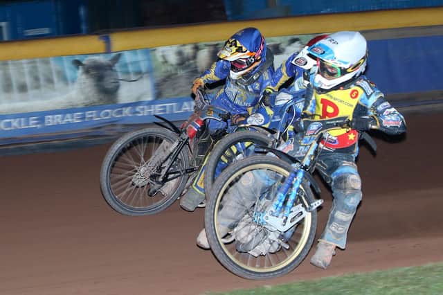 Justin Sedgmen (white) in action for Birmingham last week. Tonight he will guest at No.1 for the Monarchs. Picture: Jack Cupido.