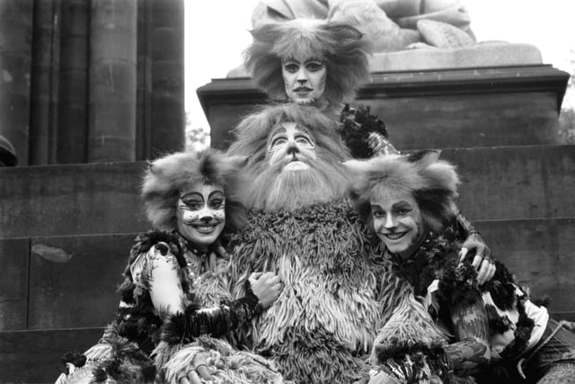 Dancers from the musical Cats at a photocall in Princes Street gardens Edinburgh, October 1989. Back row: Bombalurina (Rosemarie Ford, later a hostess on The Generation Game). Front row l-r: Rumpleteazer (Barbara King),  Mr Mistoffelees (Nick Butler) and Old Deuteronomy (Adrian Edmeades).