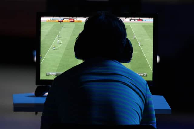 Gaming can be a source of family disharmony when everyone wants to play (Picture: Chung Sung-Jun/Getty Images)