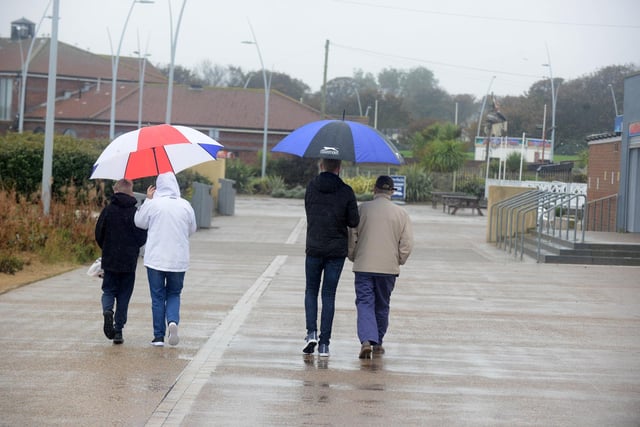 The weather doesn't stop residents getting out for a walk at the coast.