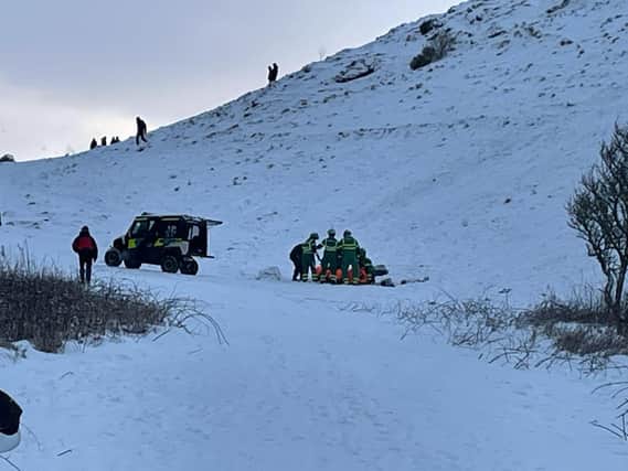 Paramedics deal with a medical incident up Arthur's Seat picture: JPI Media