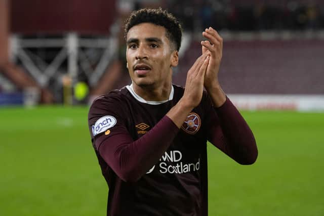 James Hill applauds the Hearts fans after a successful debut in a Tynecastle win over St Mirren, a fixture where he was named as the sponsors' man of the match. Picture: SNS