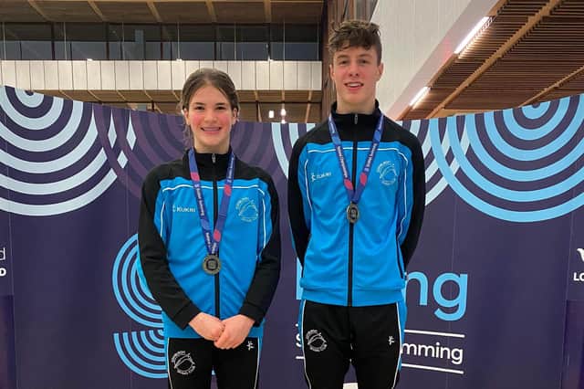 Edinburgh's Libby Duke and Angus Menmuir have been crowned Scottish platform diving champions for the first time