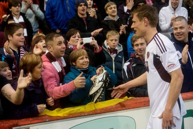 Marius Zaliukas with the Hearts fans after making his final appearance for the club in 2013. Picture: SNS