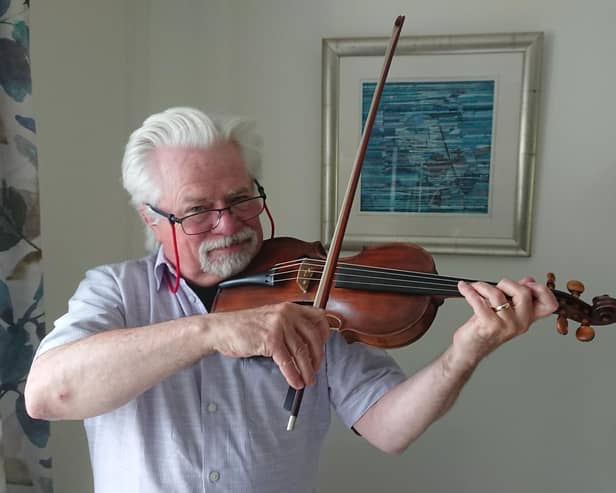 Aberdour man Frank Glynn is delighted to have his newly restored fiddle back after it was repaired by David Rattray. The fiddle once belonged to Scottish amateur musician George Thomson.