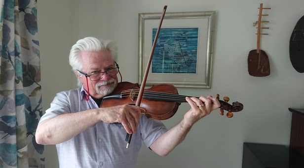 Aberdour man Frank Glynn is delighted to have his newly restored fiddle back after it was repaired by David Rattray. The fiddle once belonged to Scottish amateur musician George Thomson.