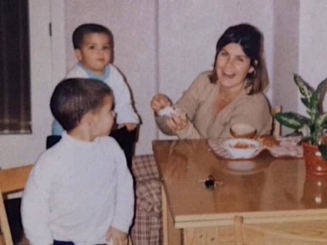 The brothers with their mother Lola during happier times growing up in Spain.