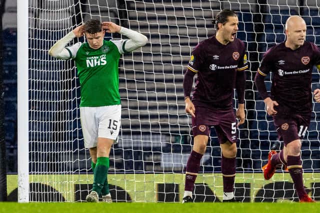 Agony for Kevin Nisbet after he misses the chance to put Hibs in front from the spot