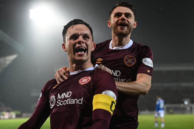 Lawrence Shankland is to remain Hearts captain.