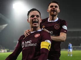 Lawrence Shankland is to remain Hearts captain.