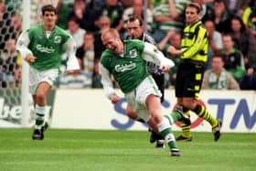 Chic Charnley wheels away in delight after netting the winner for Hibs