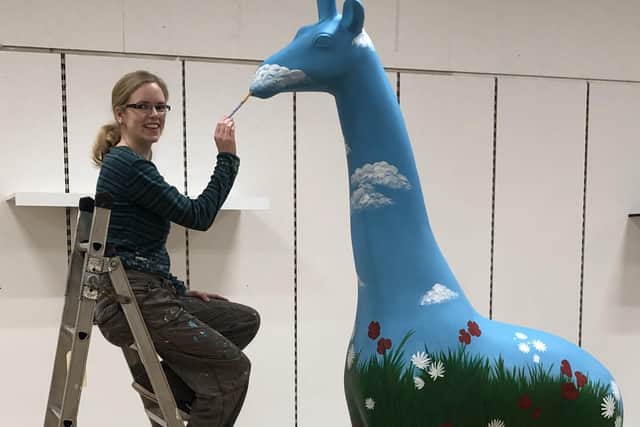 Edinburgh-based artist, Tabita W Harvey, said she's loved giraffes ever since she was licked in the face by one on a trip to the zoo, aged two.